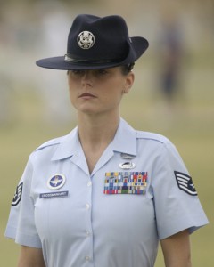 LACKLAND AIR FORCE BASE, Texas -- Staff Sgt. Michelle Crossmanhart stands at attention during a rite of passage shared by all enlisted Airmen -- the Basic Military Training graduation parade. The parade of 15 squadrons marked the end of the six-week training period for about 750 of the newest Airmen. Sergeant Crossmanhart is a military training instructor with the 323rd Training Squadron. (U.S. Air Force photo by Master Sgt. Ken Wright)